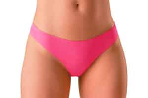 lose up of pink bikini bottoms/underwear on a woman who is interested in vaginal rejuvenation to tighten her labial tissue and develop pelvic control